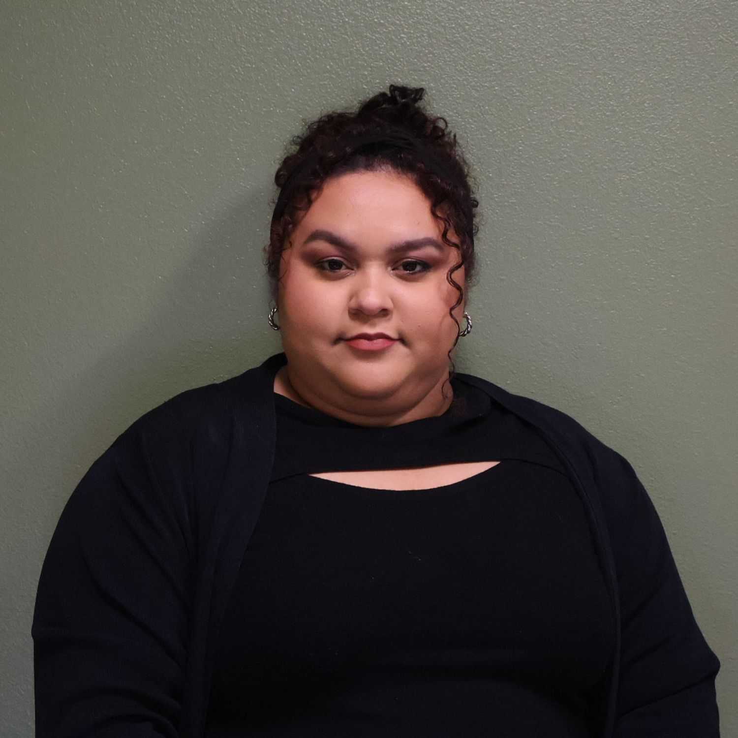 Portrait of Tarah, a professional stylist at Beautiful Inside & Out Spa, showcasing their expertise and style.